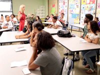 New Bedford High School Principals of Finance teacher, Judith Lima, intruduces the outline of her class to students on their first day of school.   [ PETER PEREIRA/THE STANDARD-TIMES/SCMG ]